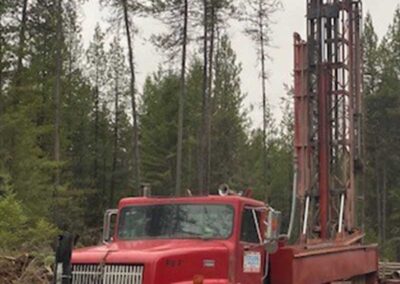 Cyclone Drilling rig out in forest